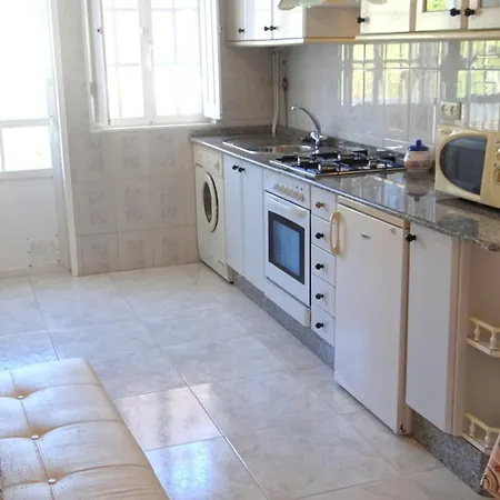 Con Balcon Al Lado De La Iglesia Larino