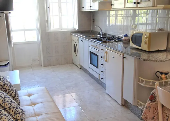 Con Balcon Al Lado De La Iglesia Larino